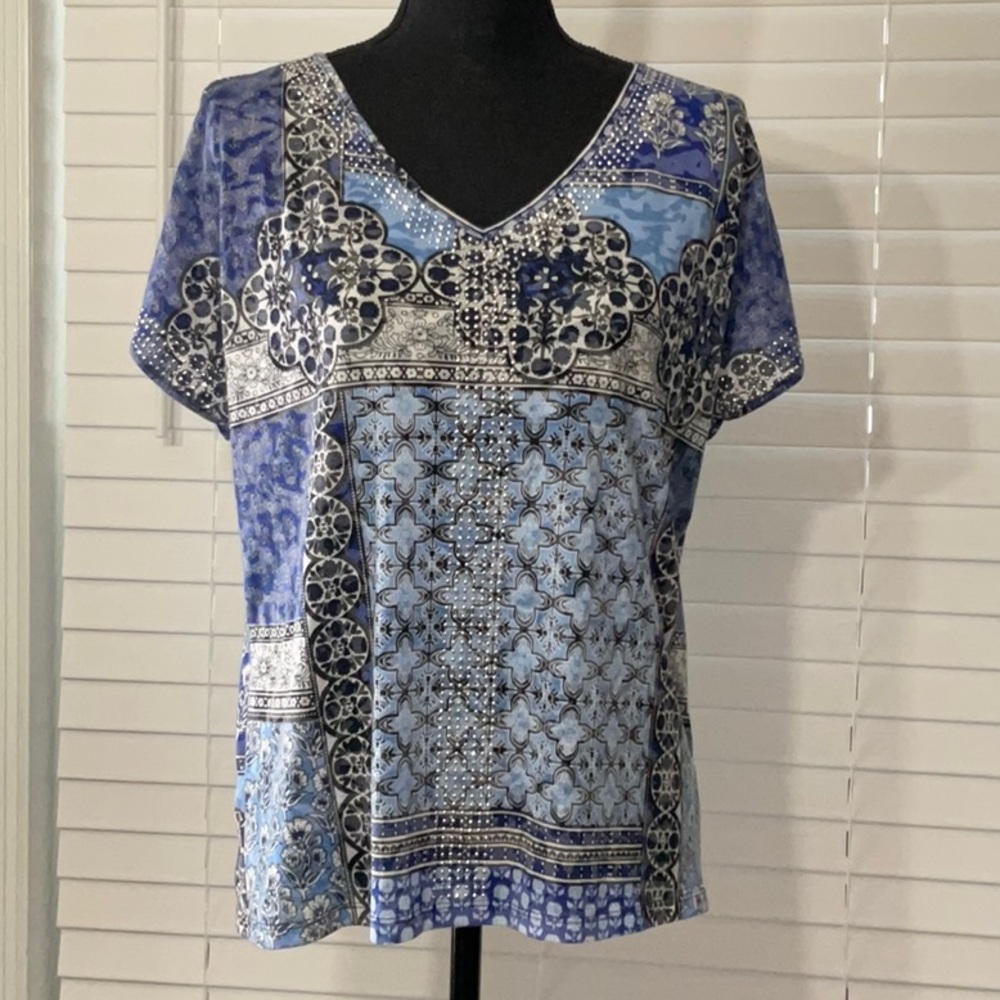 Cute cut shoulder boho top.